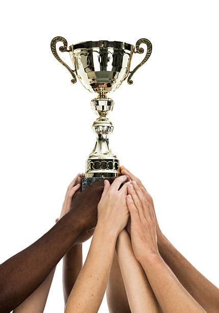 Hand Holding Trophy Stock Photos Pictures And Royalty Free Images Istock