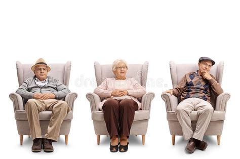 seniors sitting in armchair and looking at the camera stock image image of elderly expression