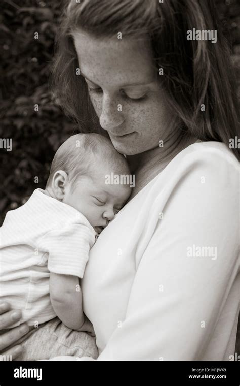 Mother Holding Newborn Baby Stock Photo Alamy