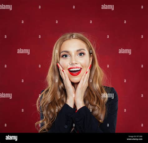 Surprised Woman With Opened Mouth On Red Background Happy Girl Having Fun Positive Emotions