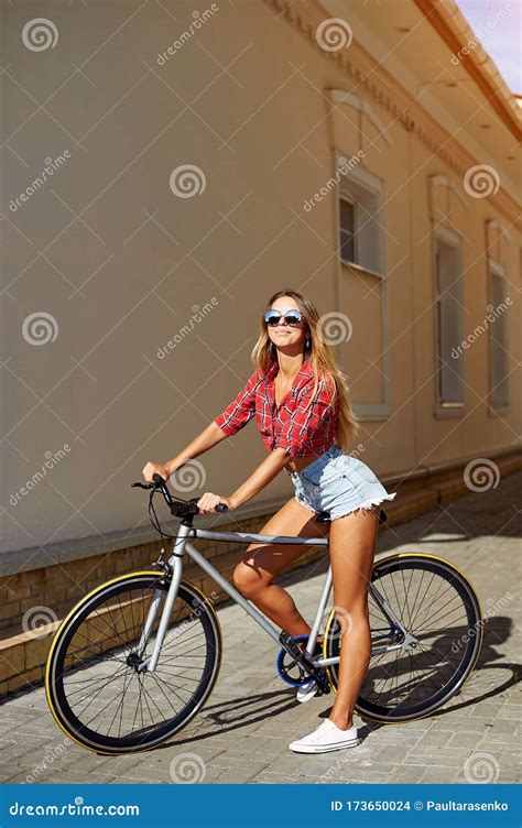 Summer Portrait Of Beautiful Blonde Woman On A Sport Bicycle Stock