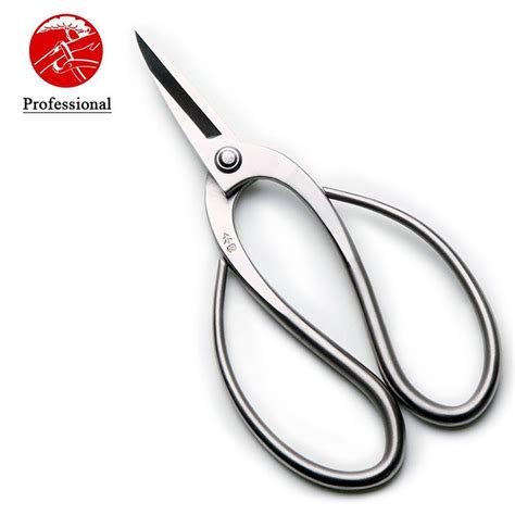 Trenching and digging in the soil near trees can cut roots, and this can damage the tree resulting in tree decline or the tree falling over. 190 mm root pruning scissors professional quality level ...