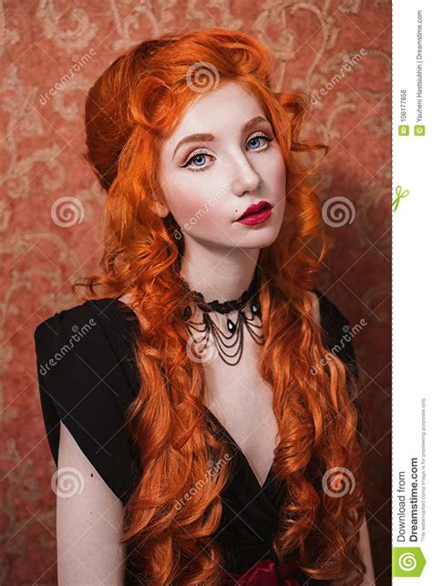 Beautiful Attractive Girl With Red Hair Stock Photo