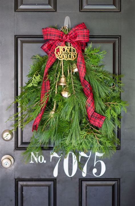 That is unless you have enthusiastic little kids in the house who wish to see the lights put up pretty much two or three weeks well in advance! Evergreen Holiday Door Swag | Christmas swags, Diy ...