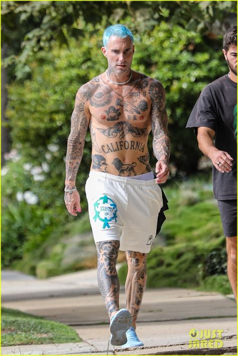 Adam Levine Puts His Many Tattoos On Display While Shirtless After A