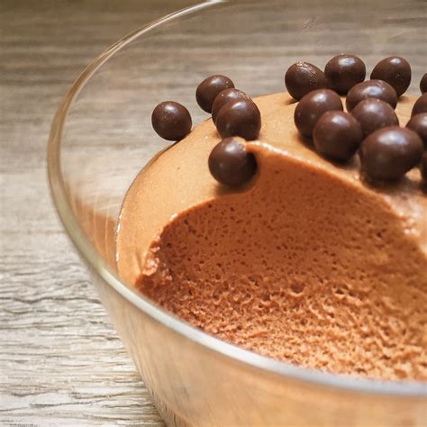 Rich chocolate mousse on moist chocolate butter cake and iced with freshly whipped cream. Chocolate Mousse — Rafaella