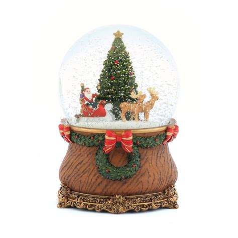 Santa Claus Riding Reindeer Christmas Sleigh And Green Christmas Tree