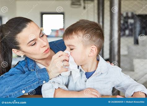 Caring Mother Blows Her Son S Nose Stock Image Image Of Protective