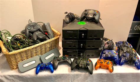 Lot 243 Three Original Xbox Consoles Plus Wiring And Controllers