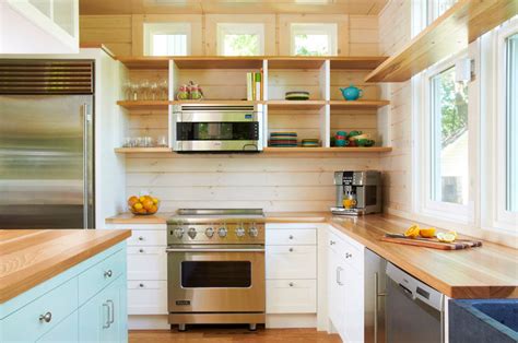 This tiny kitchen features both open and closed shelving on the top and bottom parts of the kitchen, creating the ability to display. Kitchen Design Idea - 19 Examples Of Open Shelving