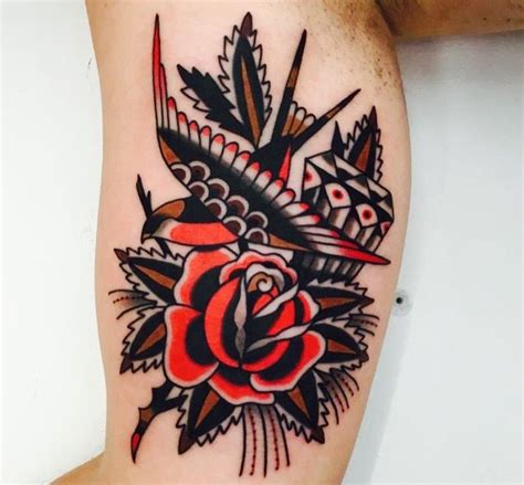 The bird has no eyes and thus it is far from reality. Swallow, Rose and Diamond tattoo