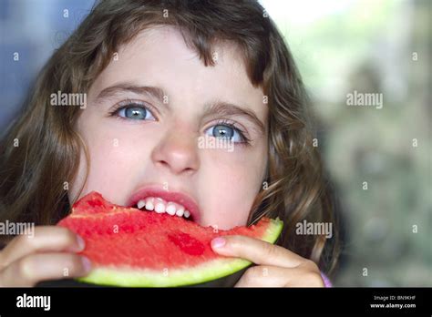 Closeup Little Girl Portrait Eating Watermelon Slice Blue Eyes Stock