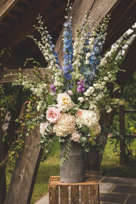 Maybe you would like to learn more about one of these? Floral Urn For Summer Wedding with pastel stocks, roses ...