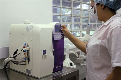 Woman Pressing Button Machine Diagnosis Lab Tests Microscope