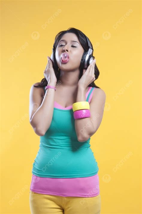 Woman Blowing Bubble While Listening To Music Photo Background And Picture For Free Download