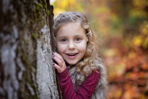 Adorable Little Girl In A Autumn Forest Stock Photo Image Of