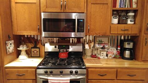 Anything cement tiles cover becomes art. We just finished installing corrugated metal backsplash in ...