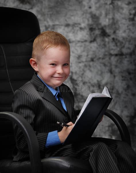 Boy Holding Book Stock Photo Image Of Young Sitting 15595974