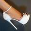 Pretty White Stilettos Edged In Lace Pictures Photos And Images For 