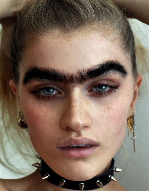 this model is embracing her unibrow eyebrow trends makeup trends beauty trends makeup tips