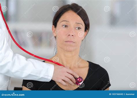 Doctor Female Listening Heartbeat Patient With Stethoscope Stock Image