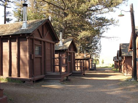 Located on a volcanic hotspot, with technicolor hot springs, gushing geysers, and wildflower strewn forests, your visit will be unforgettable…long after you leave your cabin rental near yellowstone national park. roosevelt-lodge-cabins-01