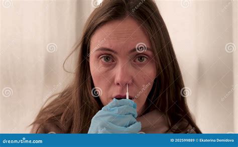 Woman Takes Swab From Nasal Mucosa Using Medical Tampon Stock Video
