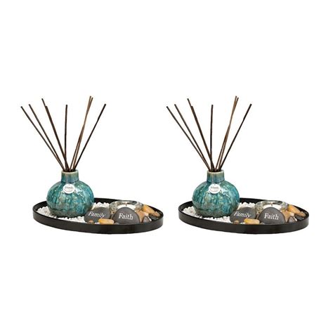 Decorative Blue Reed Diffuser In Rock Garden With Tealight Candle