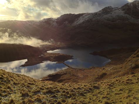 A Bridge Over A River In A Mountain Valley In Snowdonia Snowdonia