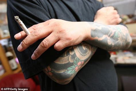 yakuza boss arrested after photo of tattoos go viral daily mail online
