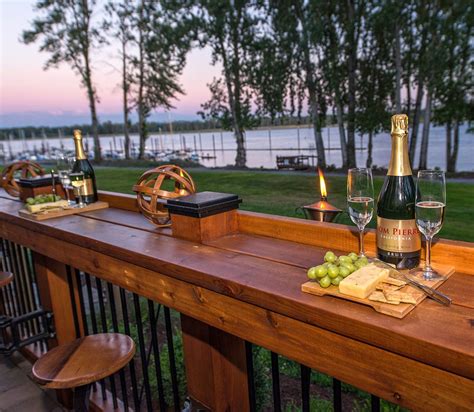 Bar extends length of Deck with pull out seating - River View http://www.paradiserestored.com