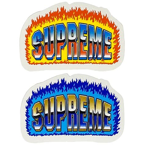 Two Stickers That Say Supreme And The Words Supreme Are In Flames On