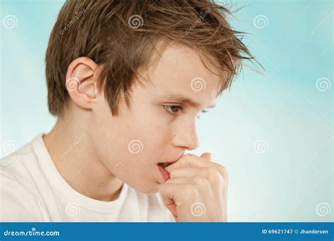 Thoughtful Worried Young Boy Biting His Nails Stock Photo Image 69621747