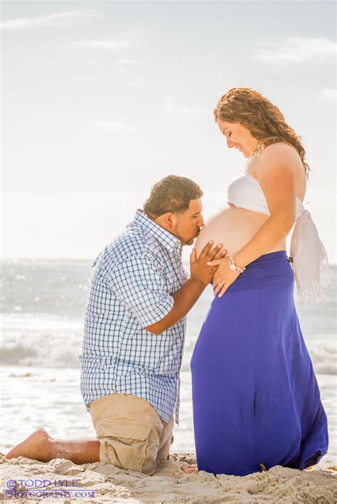 Fun Maternity Shoot At The Beach Pregnancy Photos Logan Photo Ideas Maternity Couple Photos