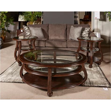 On the first floor, guest room, master bedroom, study room and living room are available. T819-0 Ashley Furniture Yexenburg Living Room Oval Cocktail Table