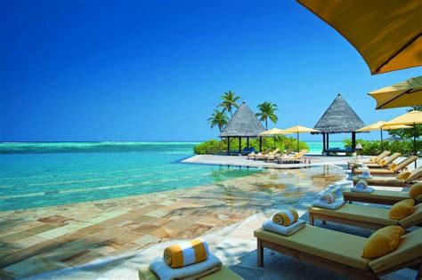 Enjoy First Class Service At Four Seasons Resort Maldives At Kuda Huraa