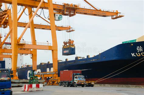Shore Crane Loading Containers In Freight Ship Editorial Stock Image