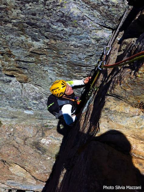 Climbing A Dihedral On Superbianciotto Route Cristalliera Photos