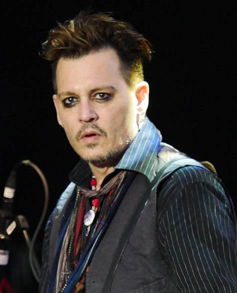 Johnny must also pay an initial £628,000 legal. Johnny Depp photographed in Denmark after concert ...