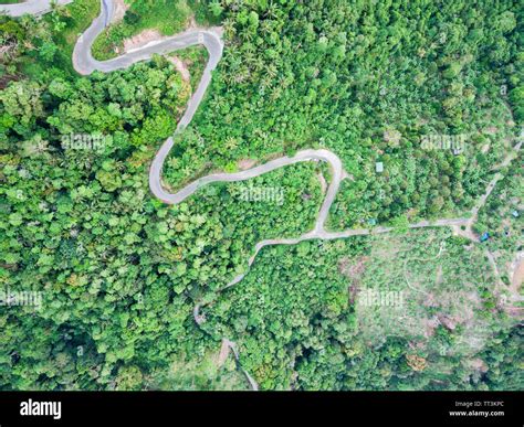 Aerial View Of Curvy Mountain Road Through A Jungle Stock Photo Alamy