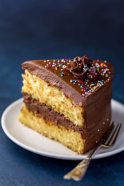 Birthday cakes can sometimes look tricky to make at home but we've got lots of easy birthday cake recipes and ideas for amateur bakers to make. Yellow Cake with Milk Chocolate Frosting - Kitchen Dose