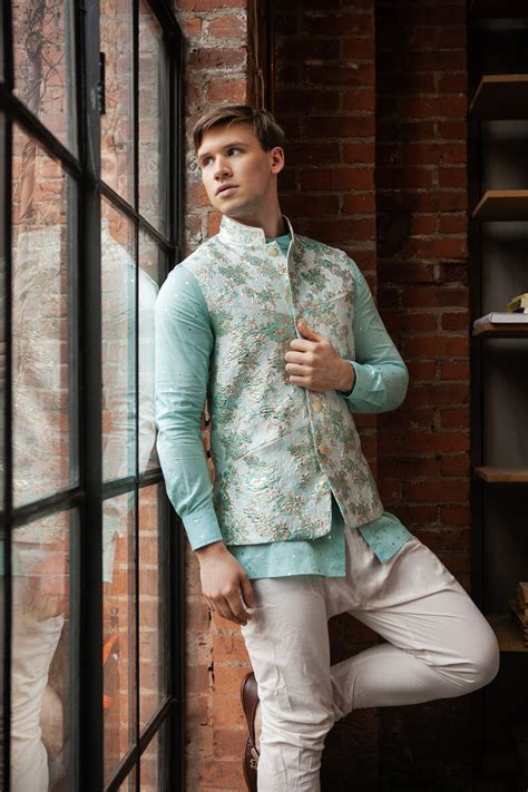 Light blue floral pattern headband outfit. MUNIR Pastel Blue Vest | Fashion suits for men, Jackets ...