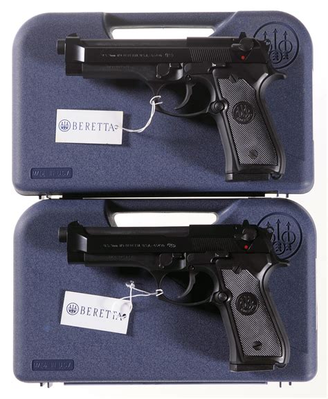 Two Beretta Model M9 Semi Automatic Pistols With Cases Rock Island