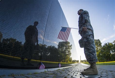 Soldier Reflects And Vietnam Memorial Wall Article The United