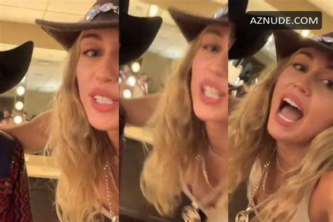 Miley Cyrus Nip Slip During A Song With A Fan AZNude