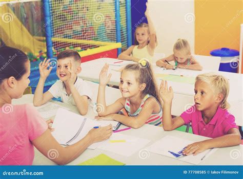 Children Sitting Together And Studying In Class At School Stock Image