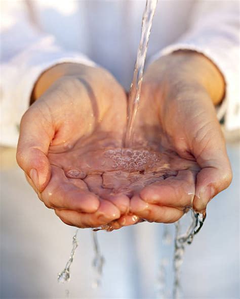 Hand Full Of Water Stock Photos Pictures And Royalty Free Images Istock