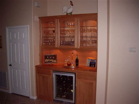 Showcase your impressive wine collection with this bar cabinet with wine storage. Built in home bar cabinets in Southern California ...