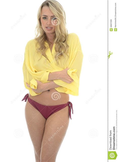 Beautiful Young Caucasian Woman Posing Pin Up In A Yellow