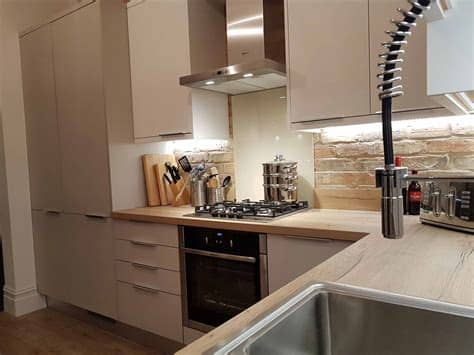 Soffits were removed to receive 36. Supermatt Cashmere Kitchen - Hallmark Kitchen Designs